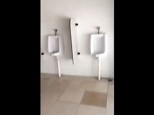 Risky wank in public bathroom