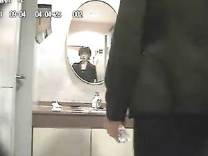 Amateur Asian CD in public bathroom