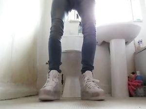 Crossdresser in tight Jeans and Sneakers